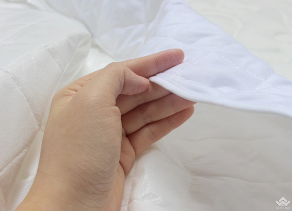 tấm bảo vệ chống thấm đặt lên đệm Hanvico