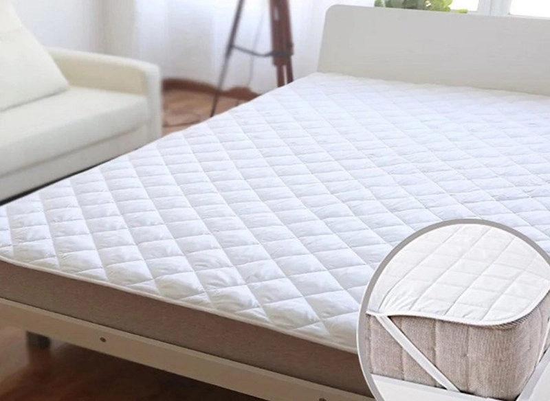tấm bảo vệ nệm chống thấm trên giường ngủ
